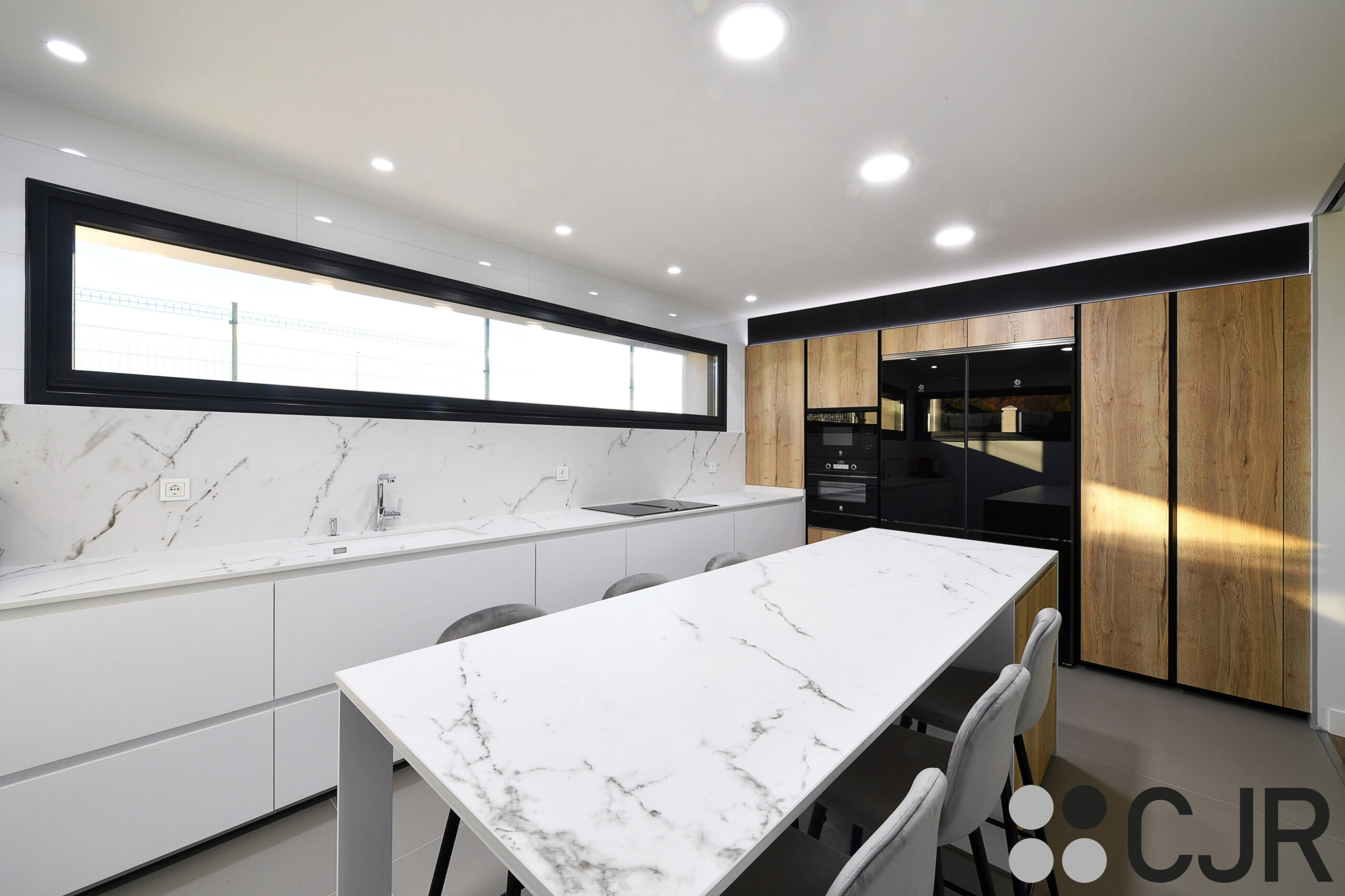 cocina dekton kairos y madera con isla cjr