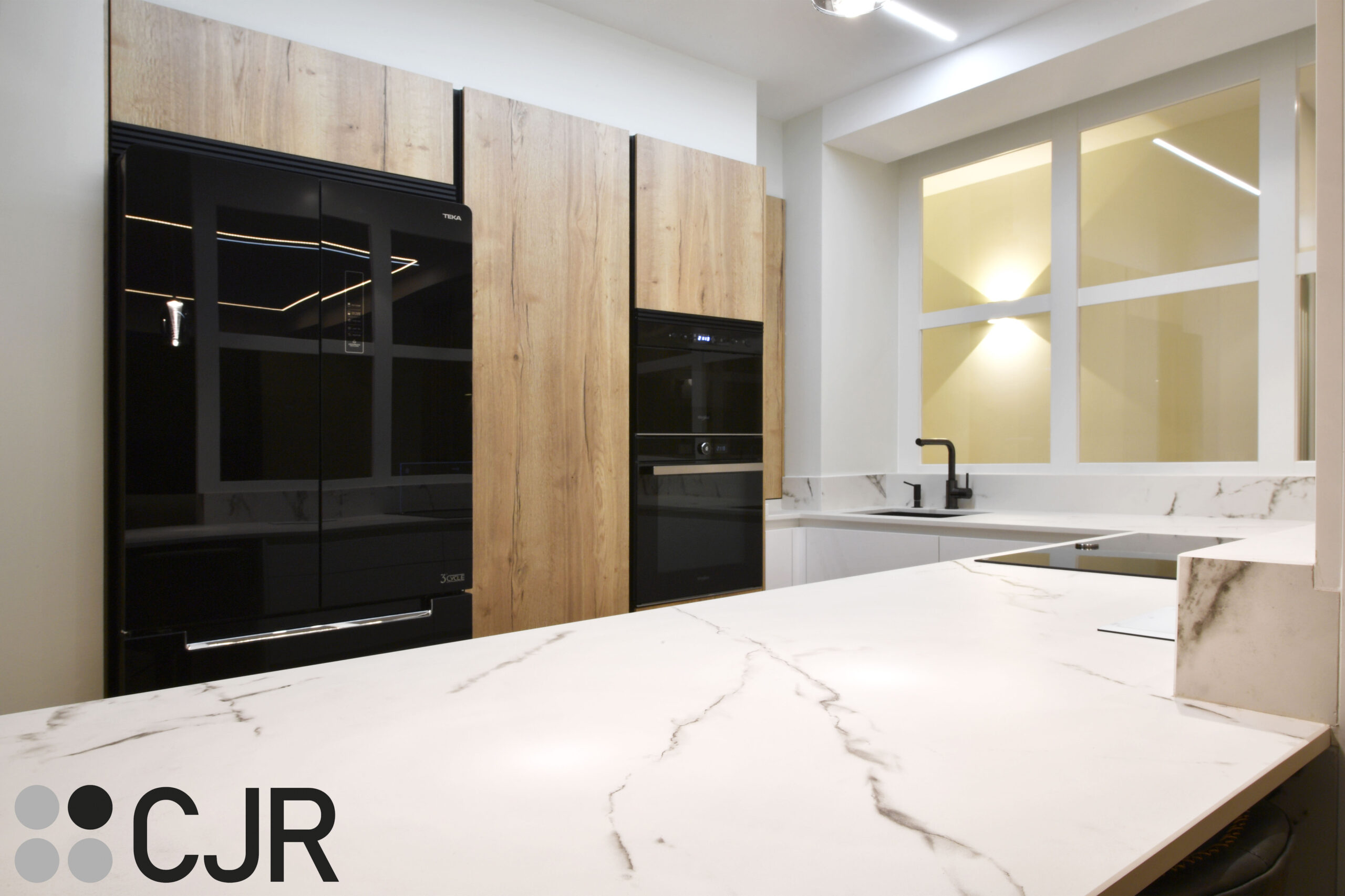 encimera dekton kairos con barra de cocina cjr