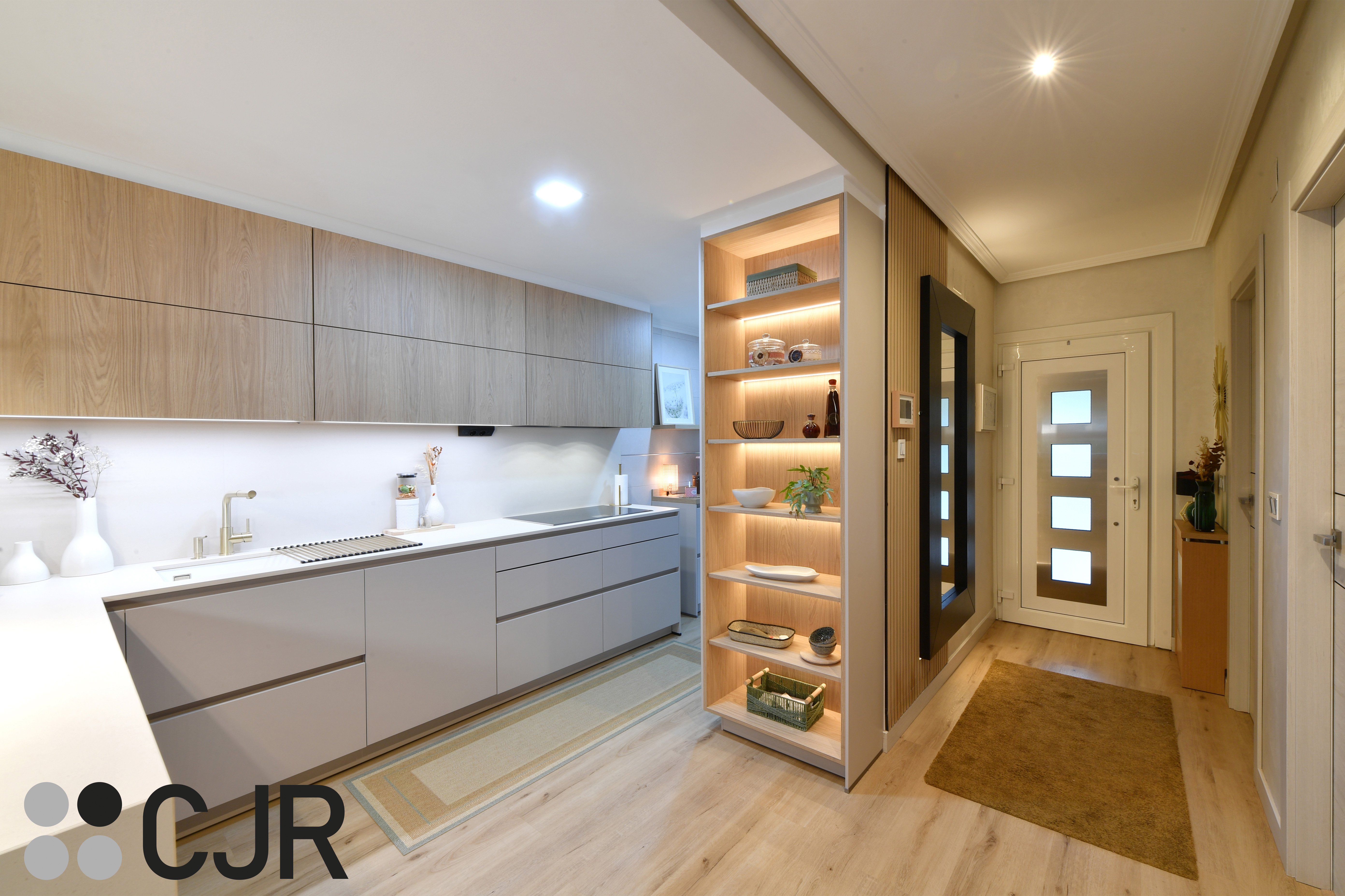 Cocina nórdica cashmere y madera con barra abierta al salón Cocinas CJR