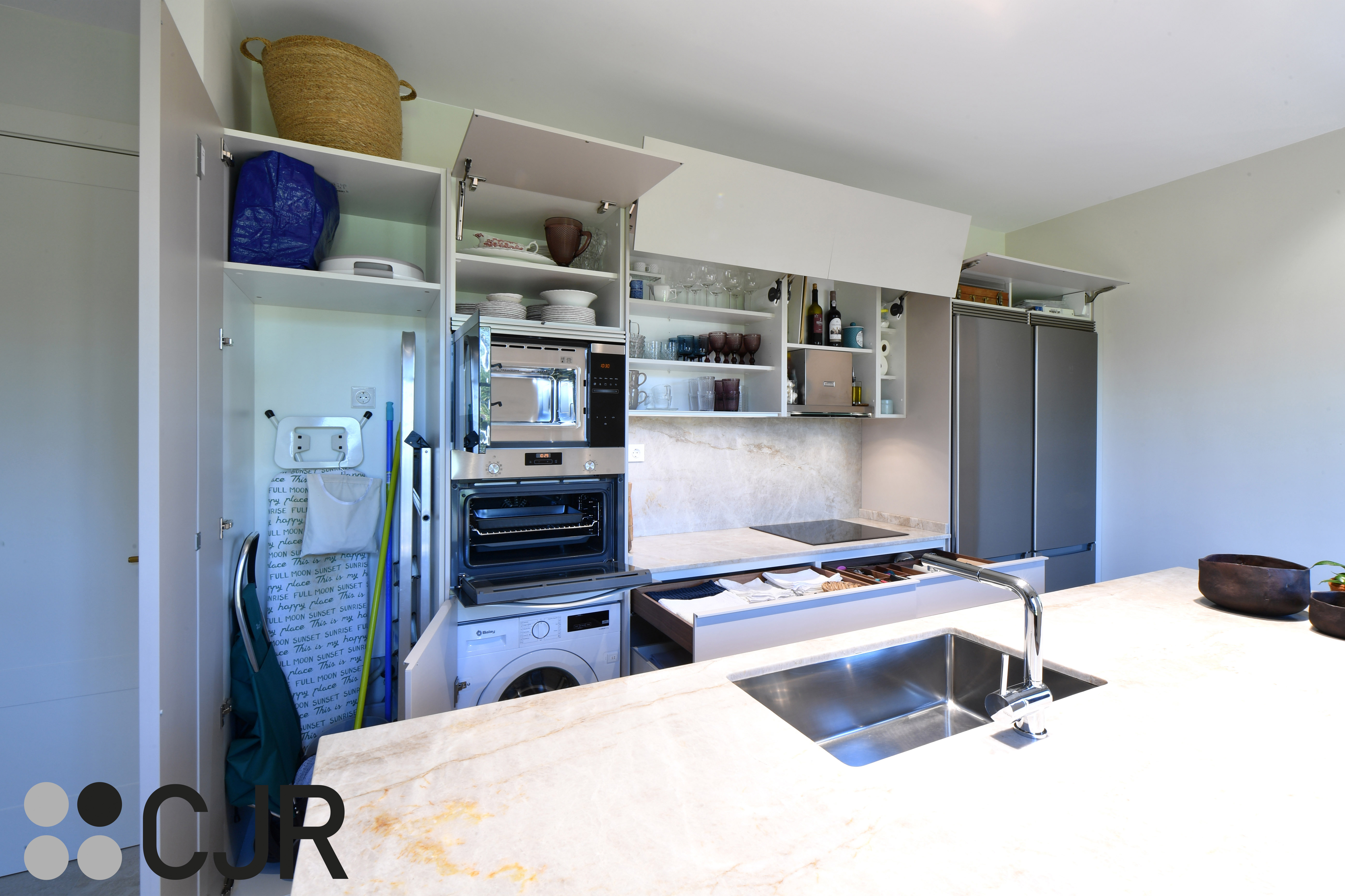 Cocina moderna cashmere con isla y barra Cocinas CJR