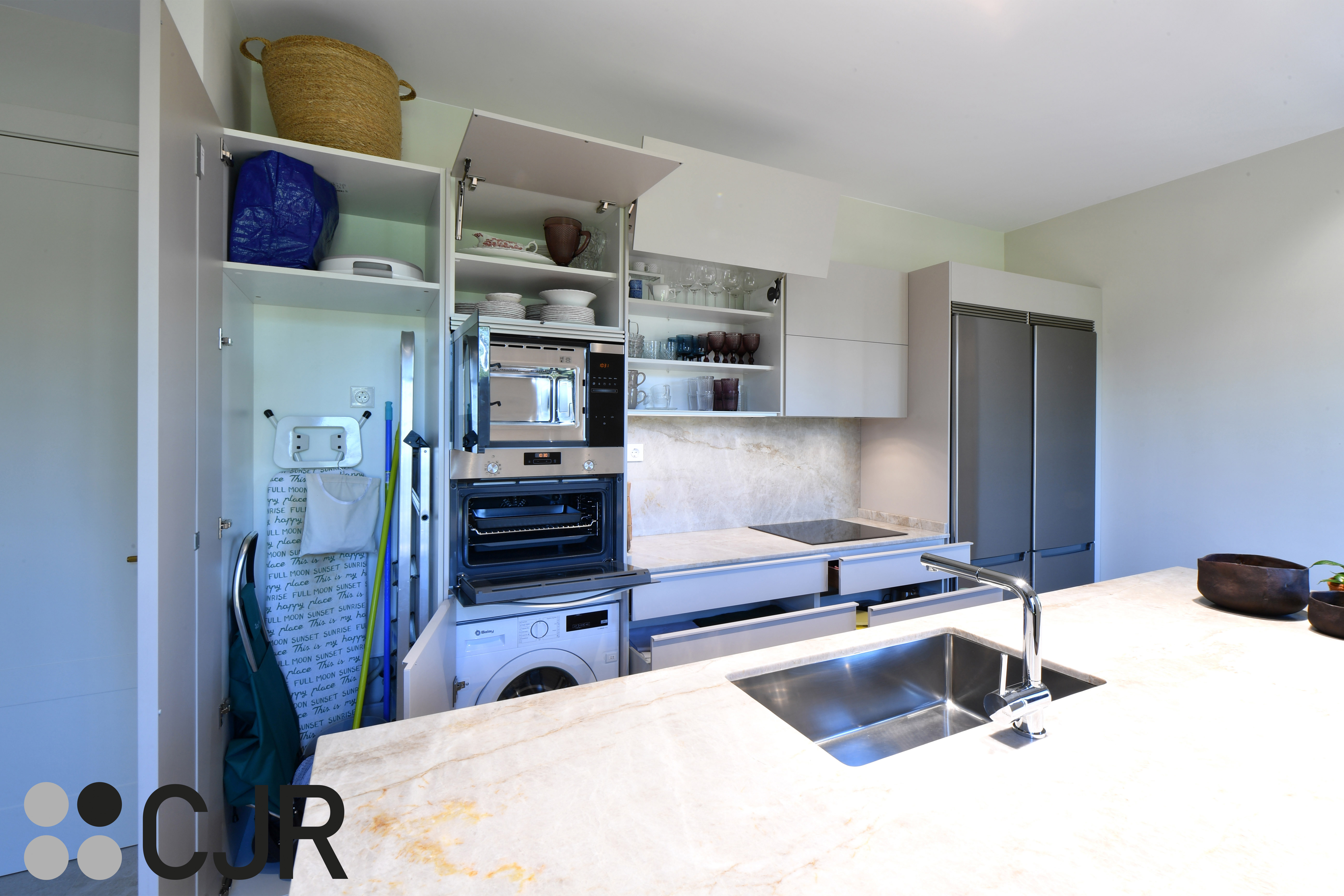 Cocina moderna cashmere con isla y barra Cocinas CJR