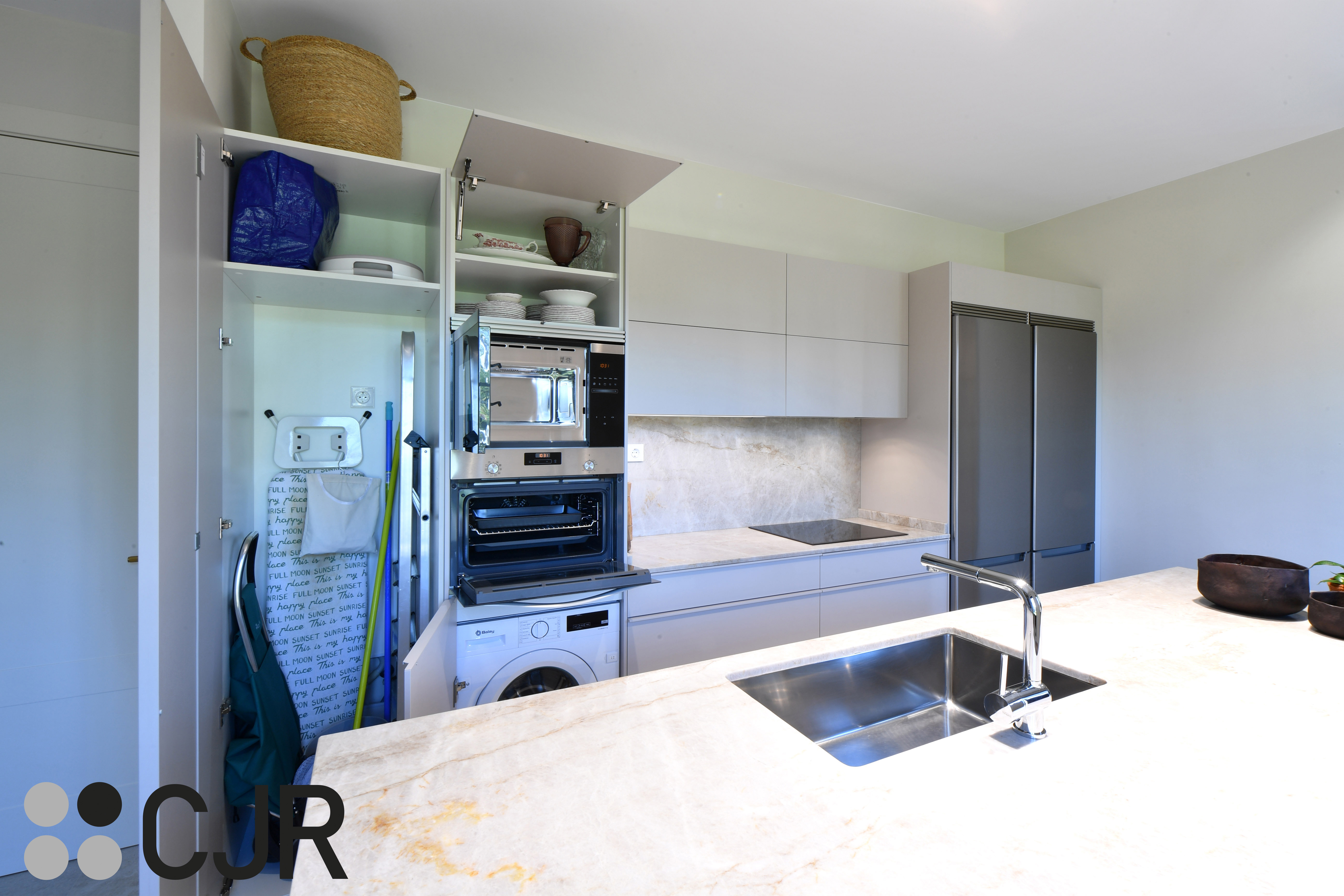 Cocina moderna cashmere con isla y barra Cocinas CJR